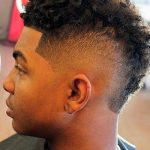 Curly Mohawk With Curved Fade